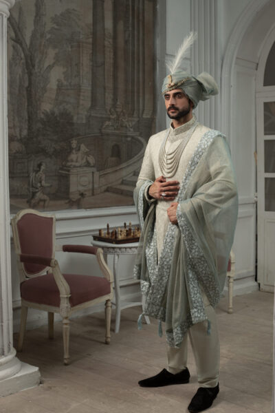 Pakistani wedding sherwani in mist green with full embroidery and regal accessories