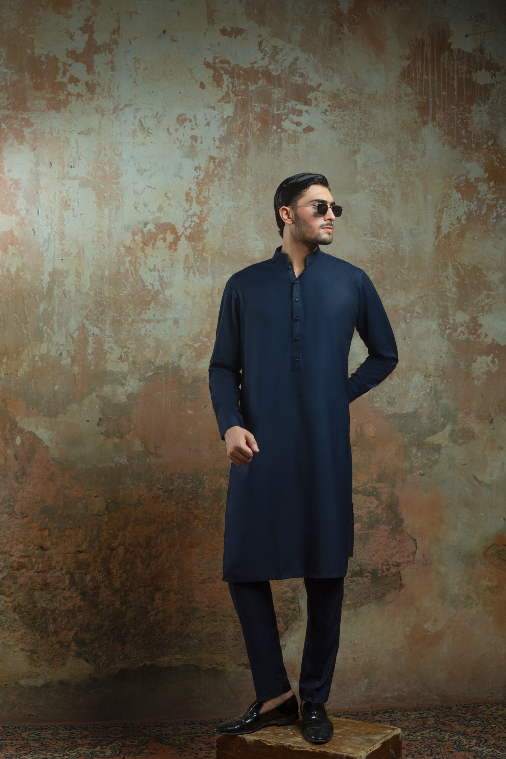 _F1A2977 NAVY BLUE MENS KURTA PYJAMA SET by Naushemian by Nauman Arfeen. Model wearing Mens Designer Traditional Wear with Band Collar Kurta for Formal Wedding Attire and Eid Outfit.