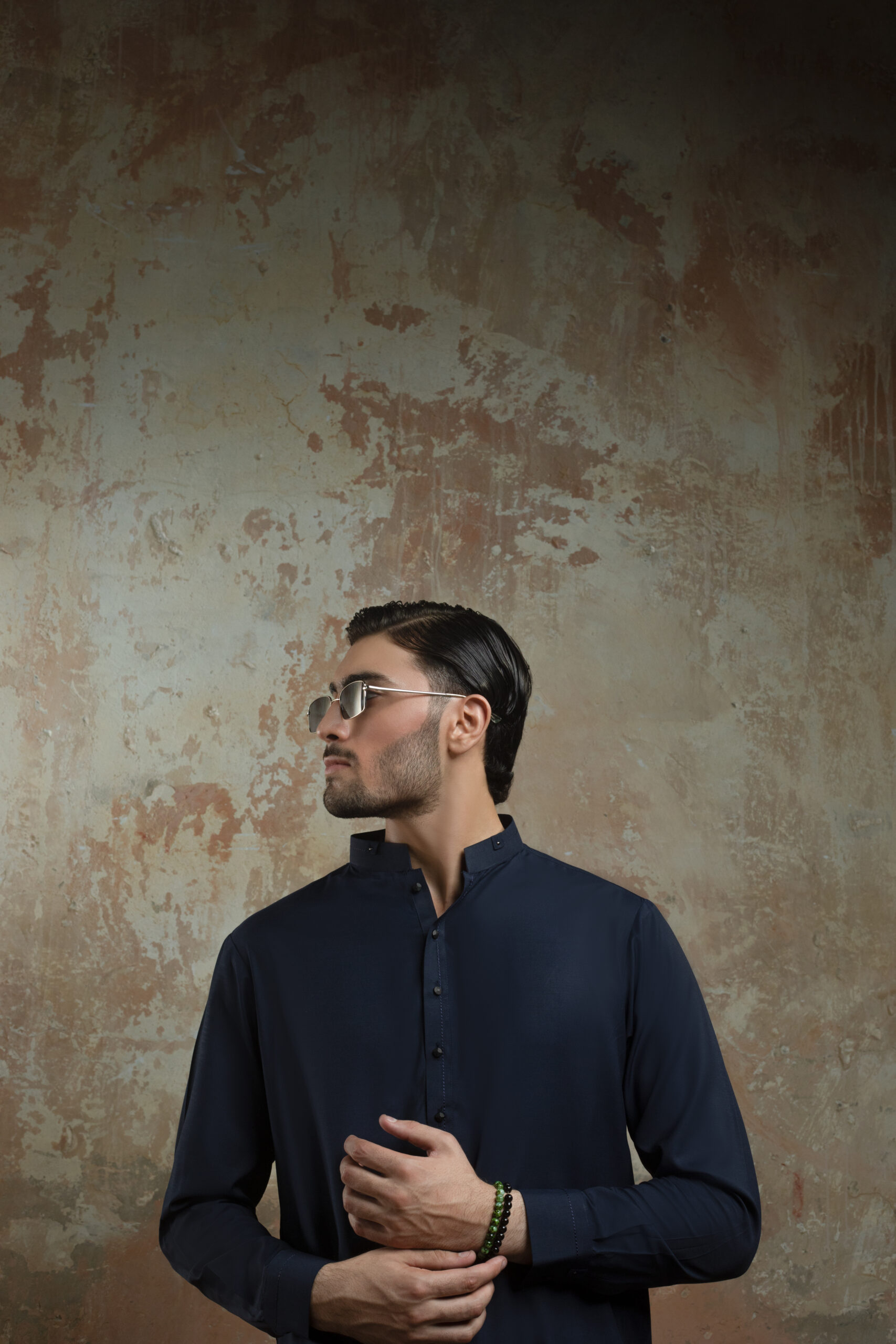 _F1A2981 NAVY BLUE MENS KURTA PYJAMA SET by Naushemian by Nauman Arfeen. Model wearing Mens Designer Traditional Wear with Band Collar Kurta for Formal Wedding Attire and Eid Outfit.