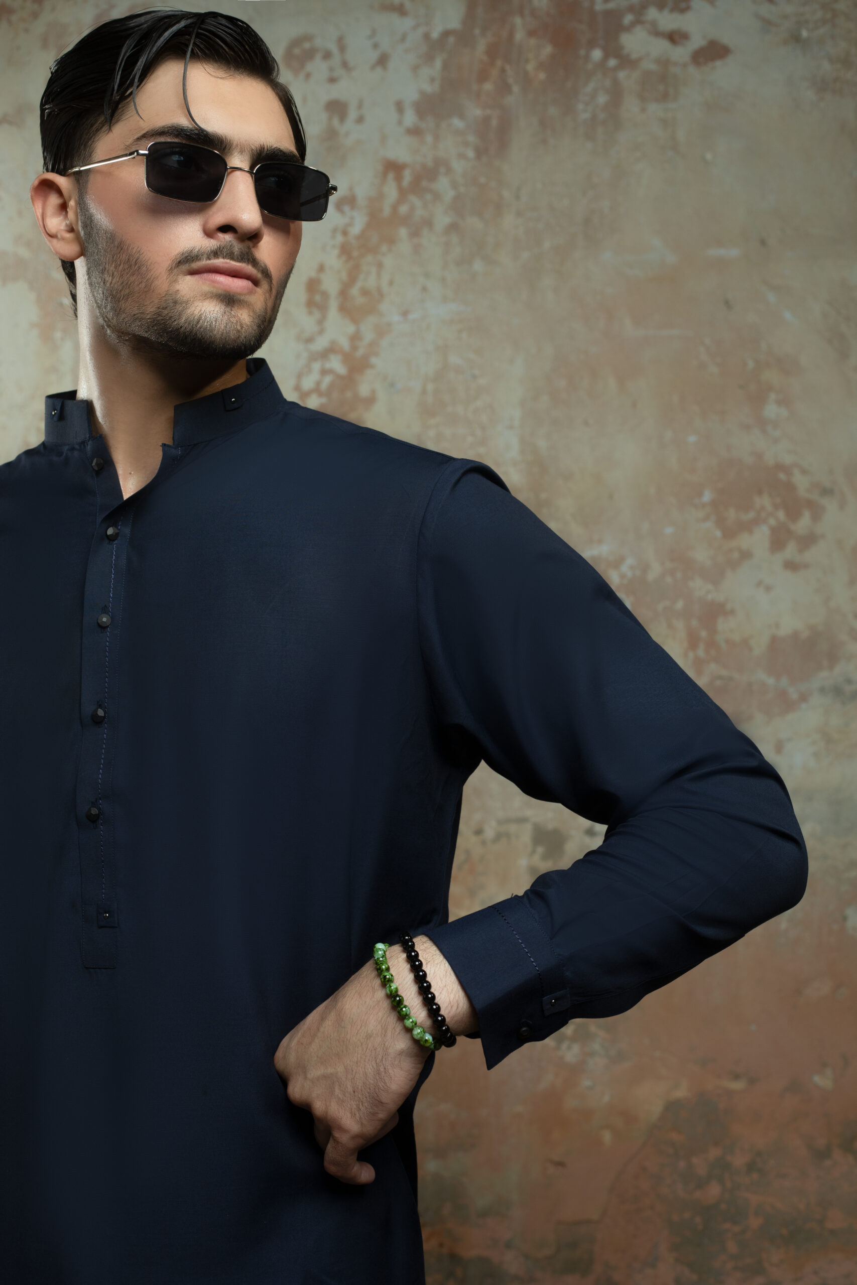 _F1A3010 NAVY BLUE MENS KURTA PYJAMA SET by Naushemian by Nauman Arfeen. Model wearing Mens Designer Traditional Wear with Band Collar Kurta for Formal Wedding Attire and Eid Outfit.