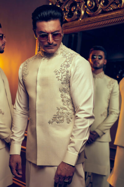 Light Embroidered Waistcoat featuring a captivating back motif designed by Nauman Arfeen.
