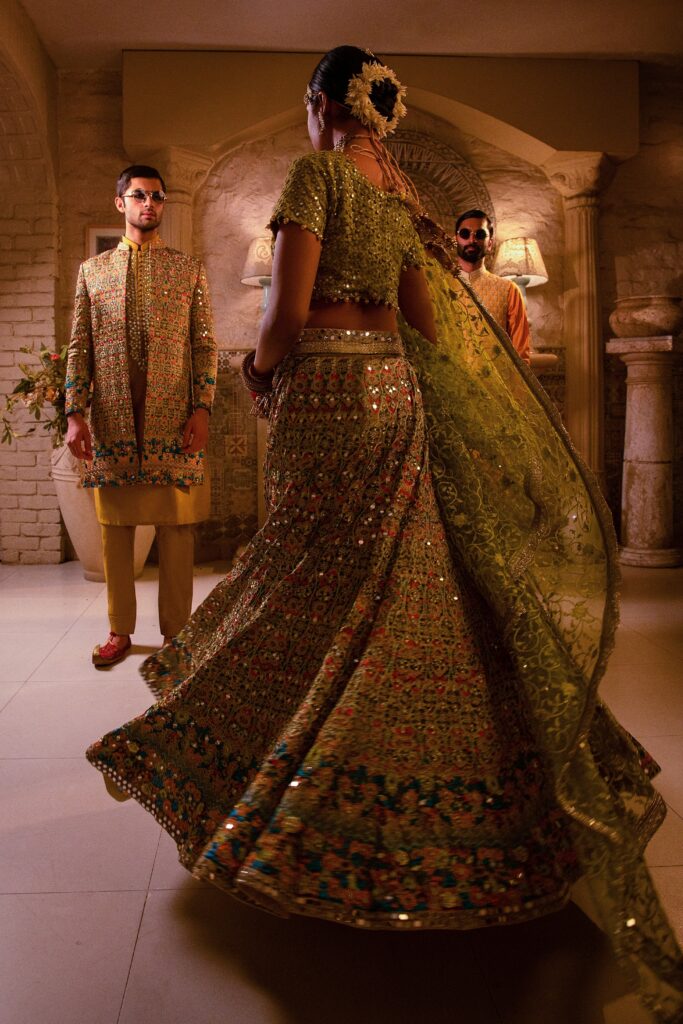 golden lehenga bride wearing beautiful golden lehenga on her mehendi by nauman arfeen - bridal dress - wedding dresses