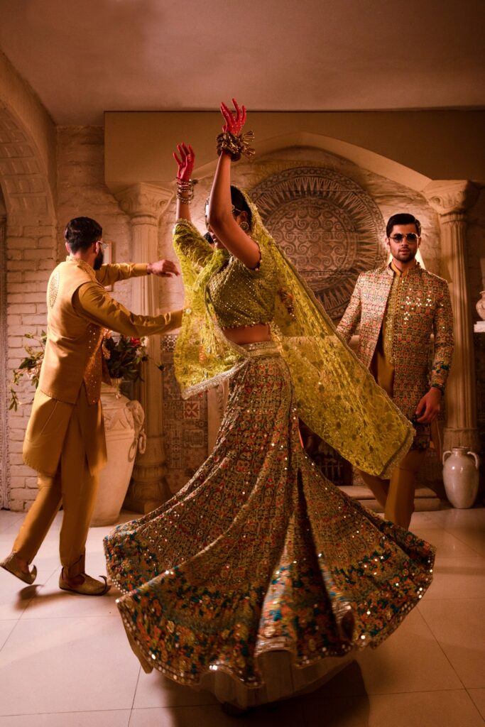 golden lehenga bride wearing beautiful golden lehenga on her mehendi by nauman arfeen - bridal dress