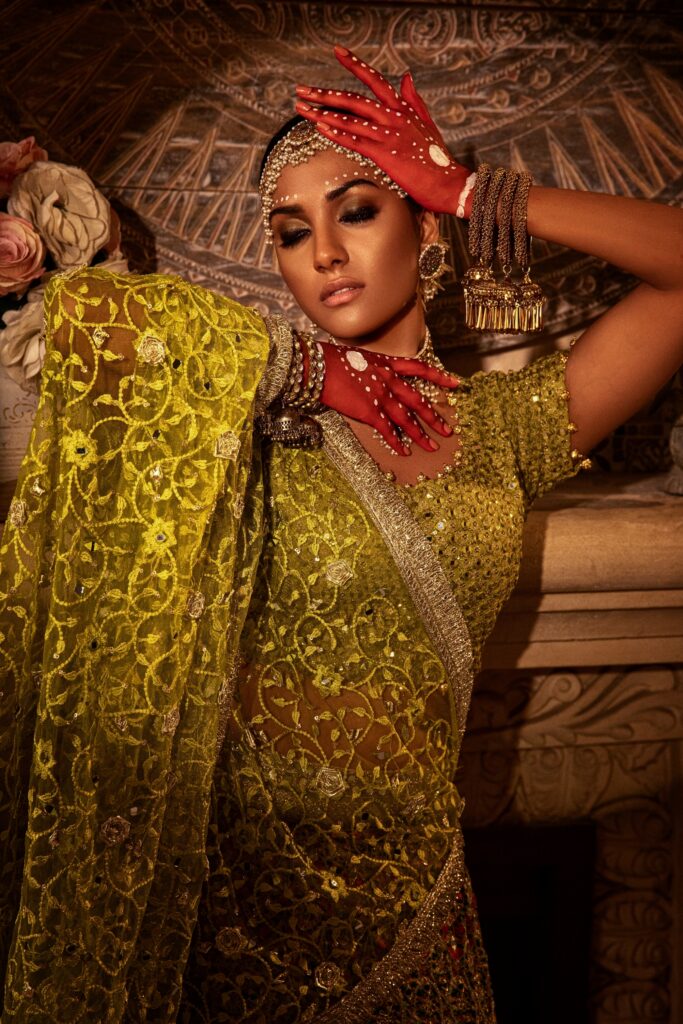 golden lehenga bride wearing beautiful golden lehenga on her mehendi by nauman arfeen - bridal dress