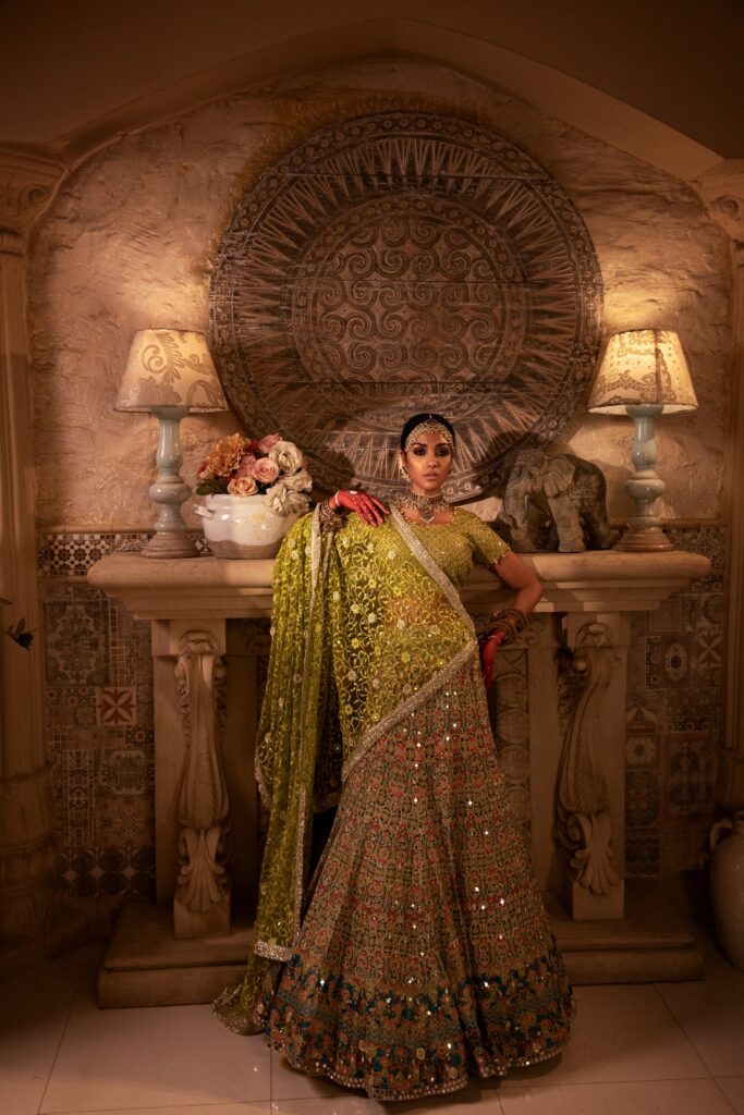 golden lehenga bride wearing beautiful golden lehenga on her mehendi by nauman arfeen - bridal dress