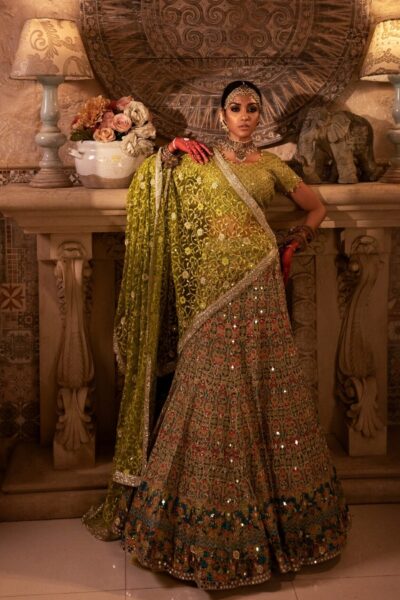 golden lehenga bride wearing beautiful golden lehenga on her mehendi by nauman arfeen - bridal dress