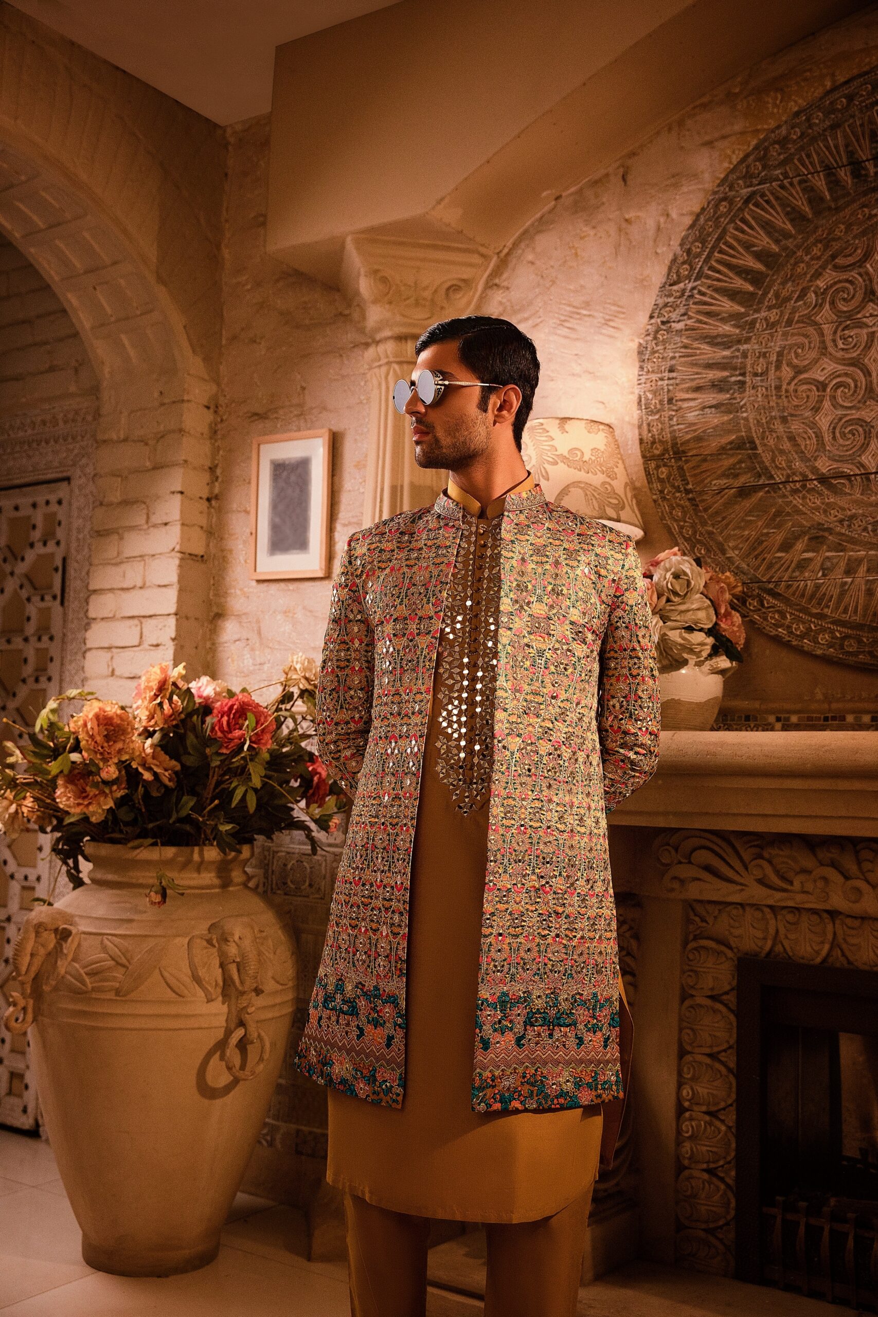 sherwani for groom man wearing short open-front sherwani for groom of Naushemian by Nauman Arfeen