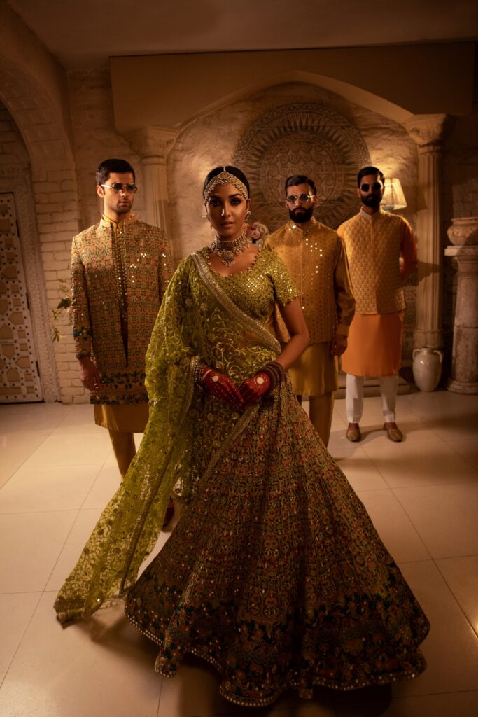 golden lehenga bride wearing beautiful golden lehenga on her mehendi by nauman arfeen - bridal dress