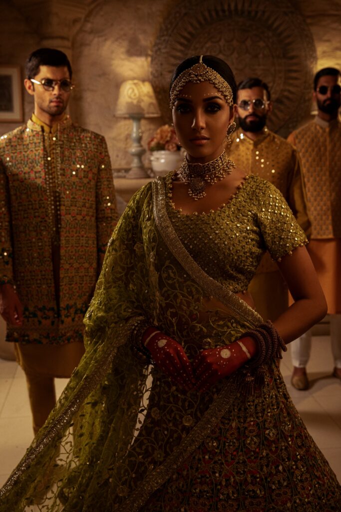 golden lehenga bride wearing beautiful golden lehenga on her mehendi by nauman arfeen - bridal dress