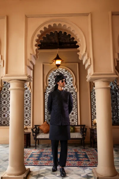 Exude timeless elegance in this stunning black prince coat. Get unlimited Prince Coat designs. Get a royal Prince coat of Nauman Arfeen