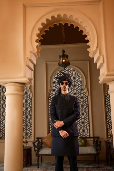 Exude timeless elegance in this stunning black prince coat. Get unlimited Prince Coat designs. Get a royal Prince coat of Nauman Arfeen
