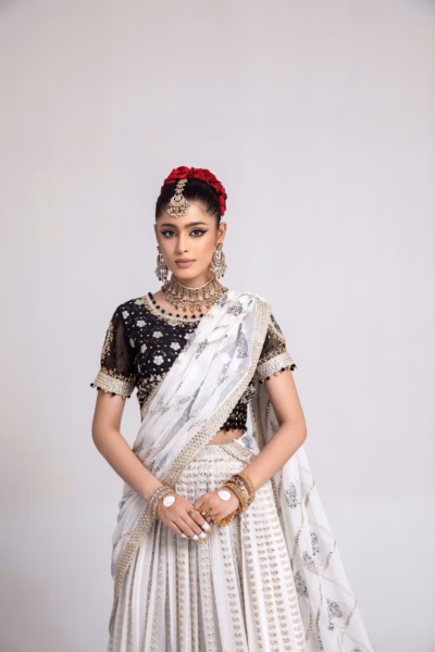 black and white ladies dress wedding wear for groom by nauman arfeen
