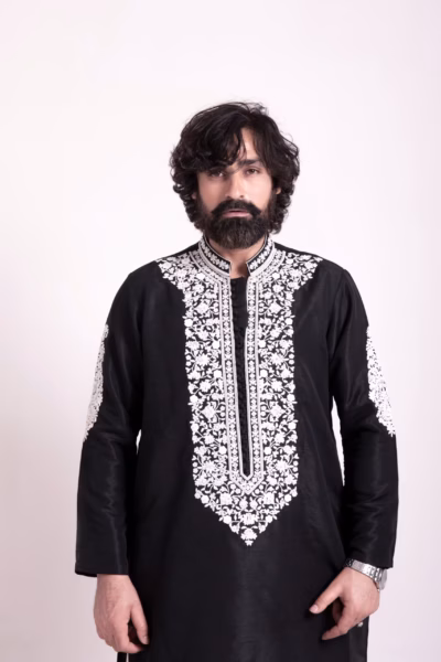exotic black kurta, featuring white neck embroidery wedding wear for groom by nauman arfeen