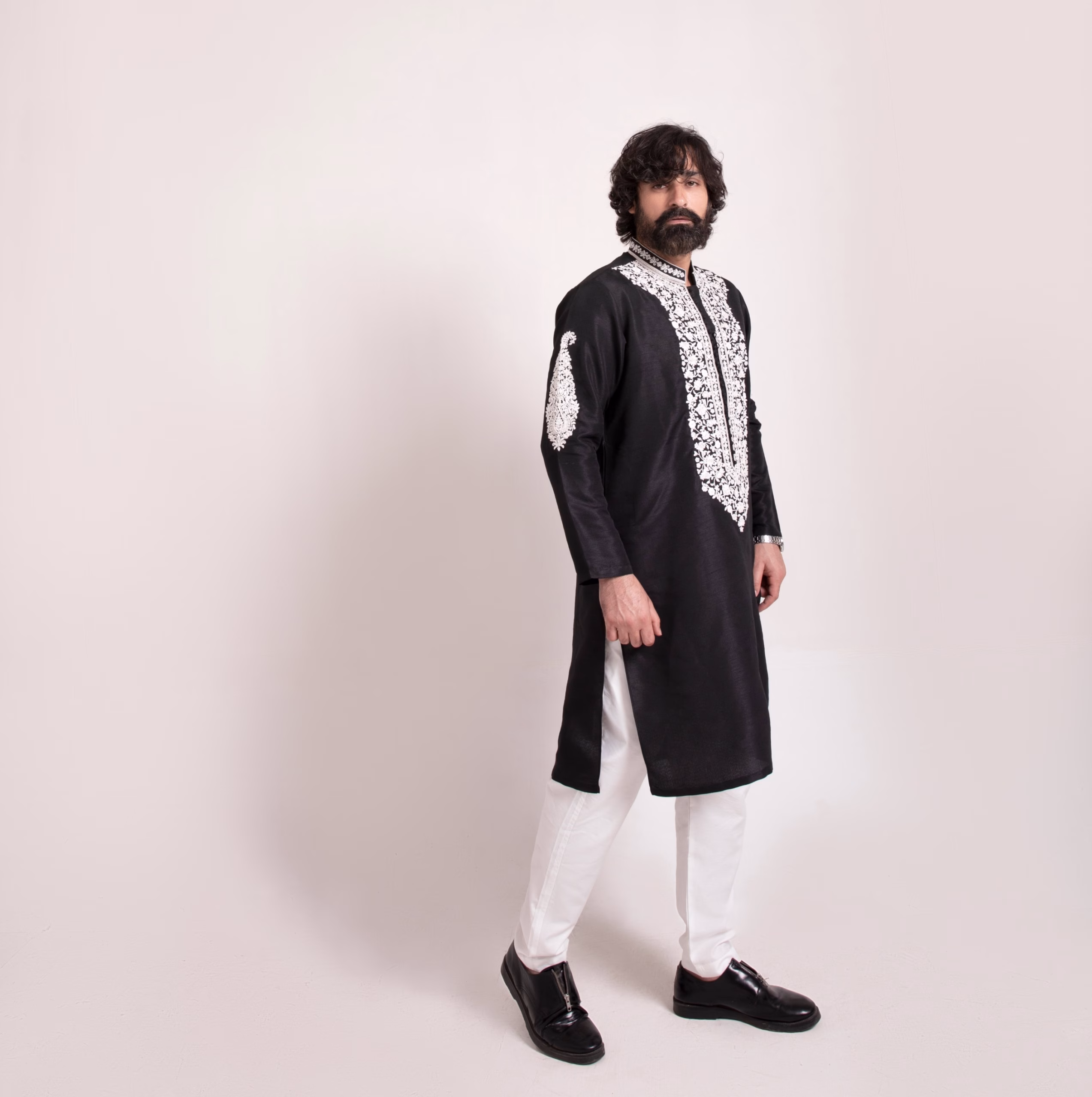 exotic black kurta, featuring white neck embroidery wedding wear for groom by nauman arfeen