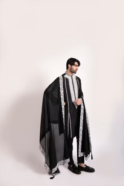 exotic black kurta, featuring white neck embroidery wedding wear for groom by nauman arfeen