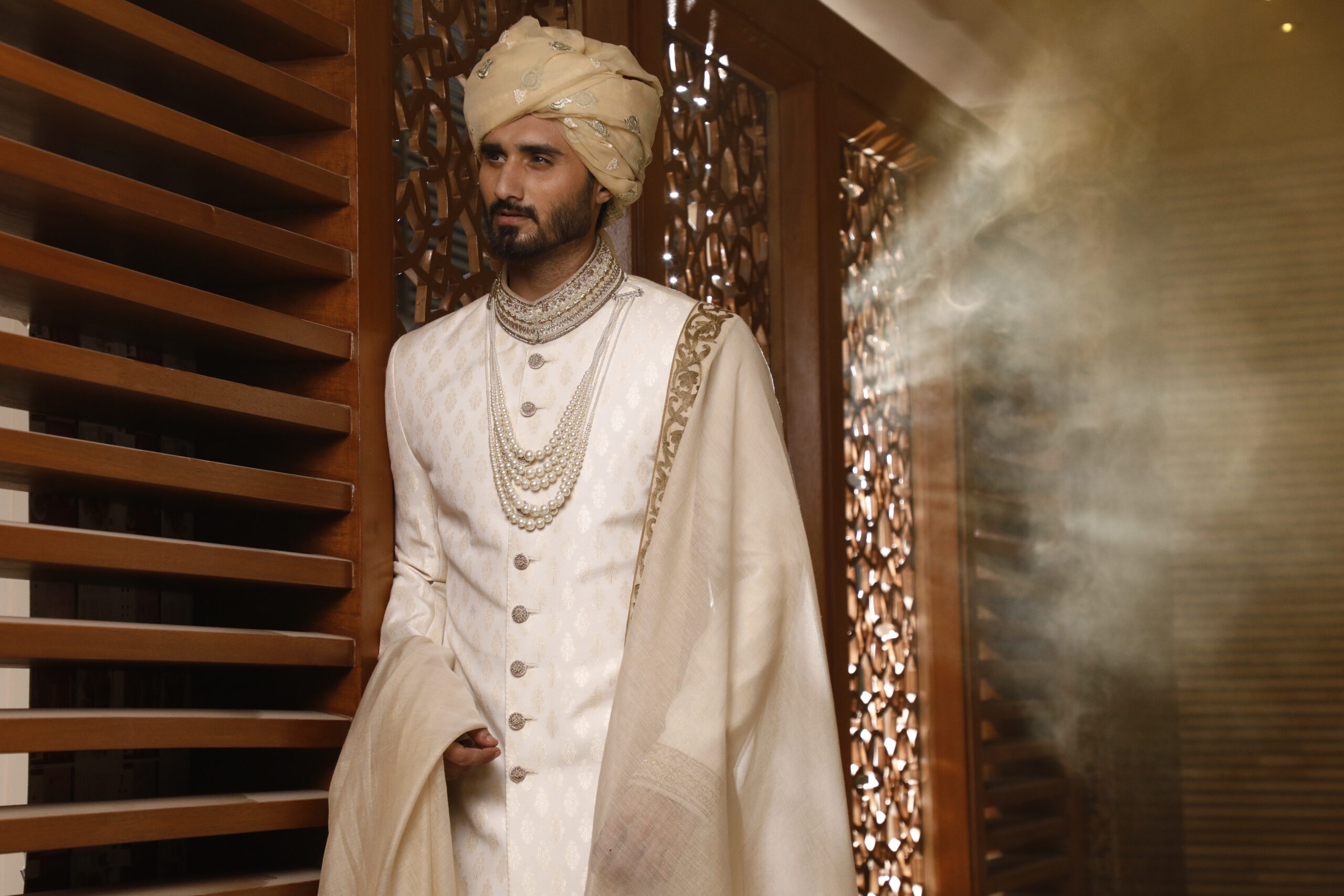 _J9A9878 vory Off-White Sherwani, with its matching turban, inner suit, and shawl