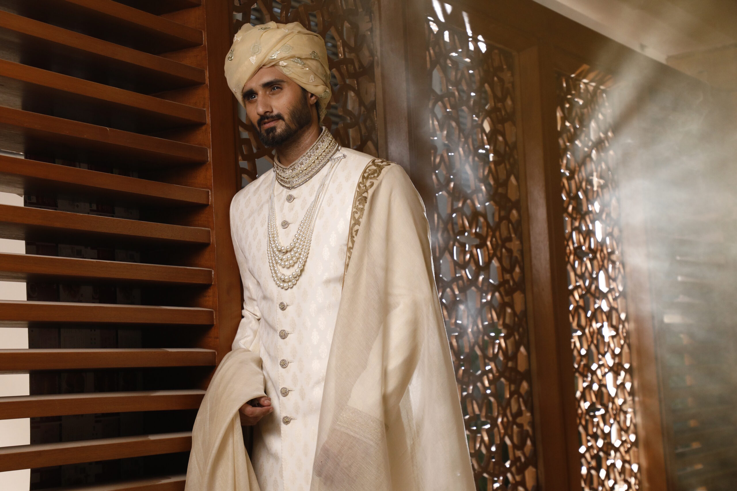 _J9A9879 vory Off-White Sherwani, with its matching turban, inner suit, and shawl